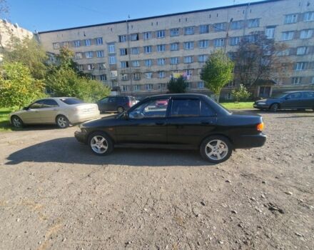 Зелений Міцубісі Lancer, об'ємом двигуна 1.8 л та пробігом 300 тис. км за 1800 $, фото 4 на Automoto.ua