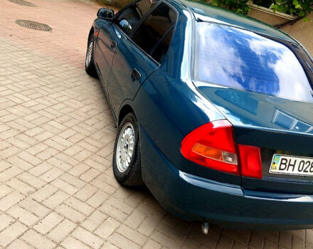 Зеленый Мицубиси Лансер, объемом двигателя 1.3 л и пробегом 300 тыс. км за 1550 $, фото 4 на Automoto.ua