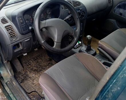 Мицубиси Лансер 1996 в Николаеве на Automoto.ua Зеленый Мицубиси Лансер, объемом двигателя 1.3 л и пробегом 100 тыс. км за 2000 $, фото 4 на Automoto.ua