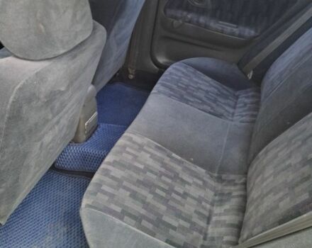 Зеленый Мицубиси Лансер, объемом двигателя 1.3 л и пробегом 400 тыс. км за 2300 $, фото 6 на Automoto.ua