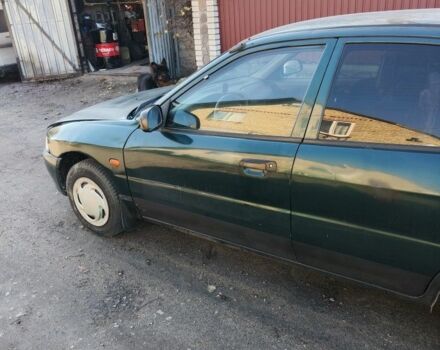 Мицубиси Лансер 1996 в Фастове на Automoto.ua Зеленый Мицубиси Лансер, объемом двигателя 1.3 л и пробегом 500 тыс. км за 1800 $, фото 5 на Automoto.ua