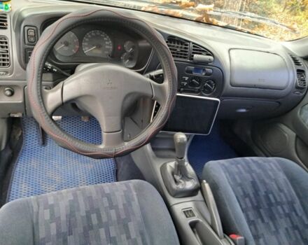 Зеленый Мицубиси Лансер, объемом двигателя 1.3 л и пробегом 400 тыс. км за 2300 $, фото 4 на Automoto.ua