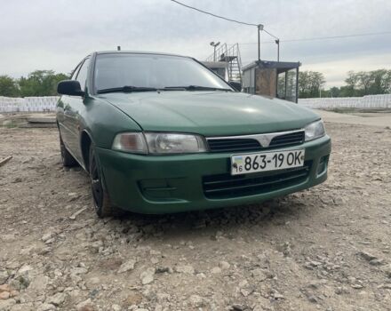 Зелений Міцубісі Lancer, об'ємом двигуна 0.13 л та пробігом 3 тис. км за 2600 $, фото 4 на Automoto.ua