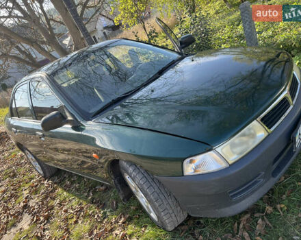 Мицубиси Лансер 2004 в Бережанах на Automoto.ua Зеленый Мицубиси Лансер, объемом двигателя 1.31 л и пробегом 250 тыс. км за 1500 $, фото 3 на Automoto.ua