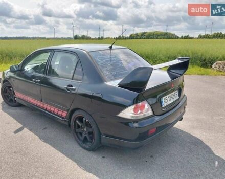 Зеленый Мицубиси Лансер, объемом двигателя 2 л и пробегом 340 тыс. км за 3500 $, фото 13 на Automoto.ua