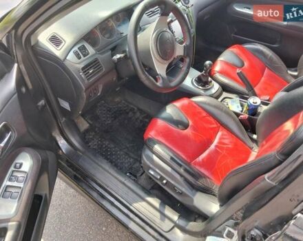 Зеленый Мицубиси Лансер, объемом двигателя 2 л и пробегом 340 тыс. км за 3500 $, фото 11 на Automoto.ua