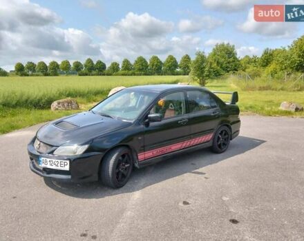 Зеленый Мицубиси Лансер, объемом двигателя 2 л и пробегом 340 тыс. км за 3500 $, фото 8 на Automoto.ua