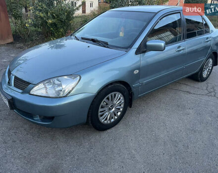 Зелений Міцубісі Lancer, об'ємом двигуна 1.6 л та пробігом 252 тис. км за 3650 $, фото 1 на Automoto.ua