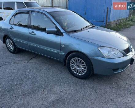 Зелений Міцубісі Lancer, об'ємом двигуна 1.6 л та пробігом 252 тис. км за 3650 $, фото 6 на Automoto.ua