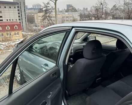 Зеленый Мицубиси Лансер, объемом двигателя 1.58 л и пробегом 207 тыс. км за 4200 $, фото 6 на Automoto.ua