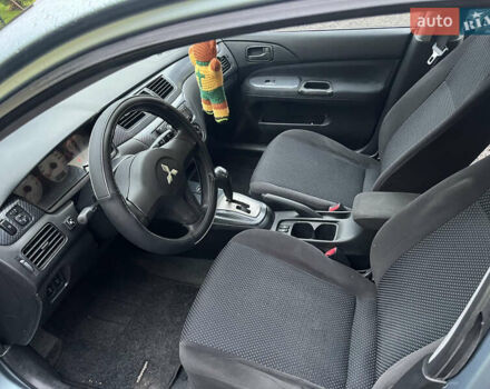 Зелений Міцубісі Lancer, об'ємом двигуна 1.6 л та пробігом 252 тис. км за 3650 $, фото 17 на Automoto.ua