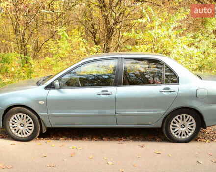 Зеленый Мицубиси Лансер, объемом двигателя 1.58 л и пробегом 259 тыс. км за 4300 $, фото 4 на Automoto.ua