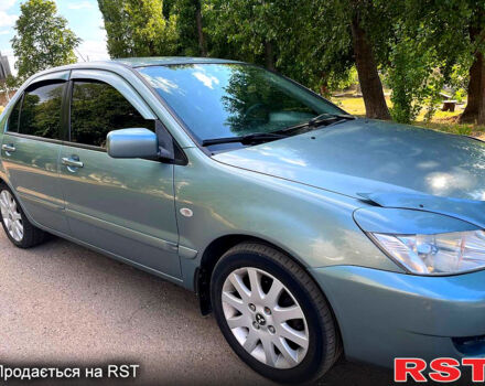 Зелений Міцубісі Lancer, об'ємом двигуна 1.6 л та пробігом 290 тис. км за 4450 $, фото 7 на Automoto.ua