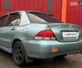 Зелений Міцубісі Lancer, об'ємом двигуна 1.58 л та пробігом 208 тис. км за 3990 $, фото 5 на Automoto.ua