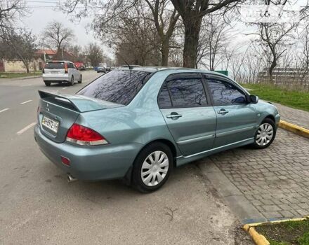 Зелений Міцубісі Lancer, об'ємом двигуна 0 л та пробігом 176 тис. км за 4900 $, фото 4 на Automoto.ua