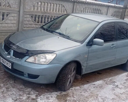 Зелений Міцубісі Lancer, об'ємом двигуна 1.6 л та пробігом 320 тис. км за 4500 $, фото 3 на Automoto.ua