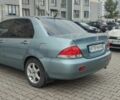 Зеленый Мицубиси Лансер, объемом двигателя 1.6 л и пробегом 247 тыс. км за 2999 $, фото 1 на Automoto.ua