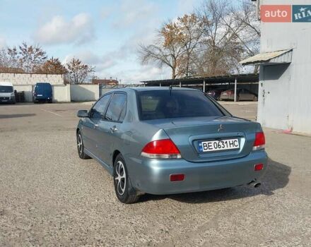 Зелений Міцубісі Lancer, об'ємом двигуна 1.58 л та пробігом 272 тис. км за 3800 $, фото 7 на Automoto.ua