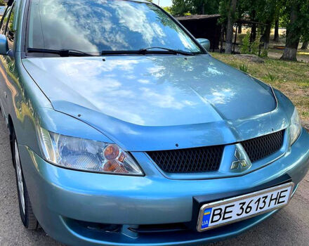 Зелений Міцубісі Lancer, об'ємом двигуна 1.6 л та пробігом 290 тис. км за 4450 $, фото 9 на Automoto.ua