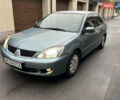 Зелений Міцубісі Lancer, об'ємом двигуна 1.6 л та пробігом 250 тис. км за 2950 $, фото 1 на Automoto.ua