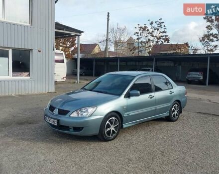Зелений Міцубісі Lancer, об'ємом двигуна 1.58 л та пробігом 272 тис. км за 3800 $, фото 5 на Automoto.ua