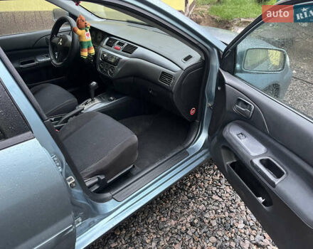 Зелений Міцубісі Lancer, об'ємом двигуна 1.6 л та пробігом 252 тис. км за 3650 $, фото 16 на Automoto.ua