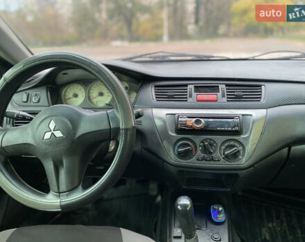 Міцубісі Lancer 2006 у Краматорске на Automoto.ua Зелений Міцубісі Lancer, об'ємом двигуна 1.58 л та пробігом 100 тис. км за 3700 $, фото 6 на Automoto.ua