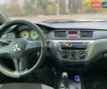 Міцубісі Lancer 2006 у Краматорске на Automoto.ua Зелений Міцубісі Lancer, об'ємом двигуна 1.58 л та пробігом 100 тис. км за 3700 $, фото 6 на Automoto.ua