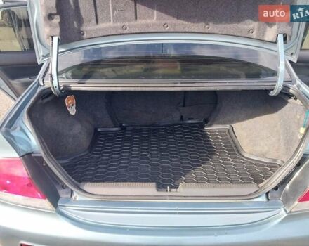 Зелений Міцубісі Lancer, об'ємом двигуна 1.58 л та пробігом 272 тис. км за 3800 $, фото 24 на Automoto.ua