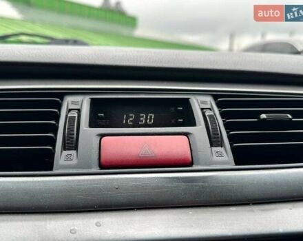 Зелений Міцубісі Lancer, об'ємом двигуна 1.58 л та пробігом 208 тис. км за 3990 $, фото 20 на Automoto.ua