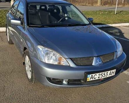 Зелений Міцубісі Lancer, об'ємом двигуна 1.58 л та пробігом 215 тис. км за 5000 $, фото 2 на Automoto.ua