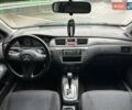 Зелений Міцубісі Lancer, об'ємом двигуна 1.58 л та пробігом 208 тис. км за 3990 $, фото 12 на Automoto.ua