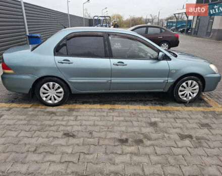 Зелений Міцубісі Lancer, об'ємом двигуна 1.6 л та пробігом 265 тис. км за 3800 $, фото 3 на Automoto.ua