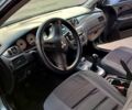 Зеленый Мицубиси Лансер, объемом двигателя 1.6 л и пробегом 203 тыс. км за 4100 $, фото 7 на Automoto.ua