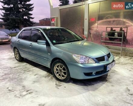 Зеленый Мицубиси Лансер, объемом двигателя 1.58 л и пробегом 352 тыс. км за 3700 $, фото 4 на Automoto.ua