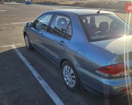 Зелений Міцубісі Lancer, об'ємом двигуна 1.58 л та пробігом 215 тис. км за 5000 $, фото 4 на Automoto.ua