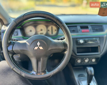 Мицубиси Лансер 2006 в Николаеве на Automoto.ua Зеленый Мицубиси Лансер, объемом двигателя 1.58 л и пробегом 271 тыс. км за 4599 $, фото 17 на Automoto.ua