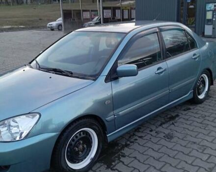 Зеленый Мицубиси Лансер, объемом двигателя 1.58 л и пробегом 244 тыс. км за 4900 $, фото 3 на Automoto.ua