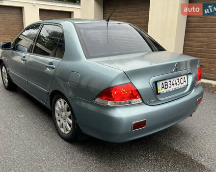 Зелений Міцубісі Lancer, об'ємом двигуна 1.6 л та пробігом 250 тис. км за 2950 $, фото 3 на Automoto.ua