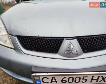 Зеленый Мицубиси Лансер, объемом двигателя 1.58 л и пробегом 224 тыс. км за 3500 $, фото 9 на Automoto.ua