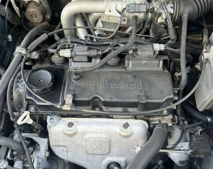 Зеленый Мицубиси Лансер, объемом двигателя 1.58 л и пробегом 207 тыс. км за 4200 $, фото 20 на Automoto.ua