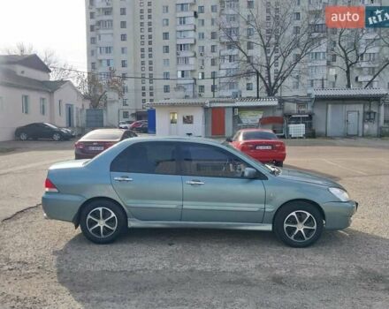 Зеленый Мицубиси Лансер, объемом двигателя 1.6 л и пробегом 270 тыс. км за 4200 $, фото 11 на Automoto.ua