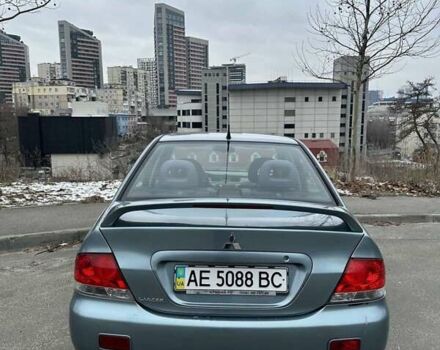 Зеленый Мицубиси Лансер, объемом двигателя 1.58 л и пробегом 207 тыс. км за 4200 $, фото 11 на Automoto.ua