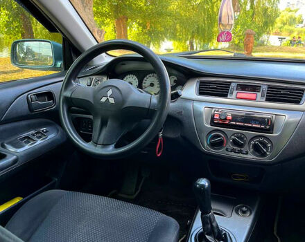 Зелений Міцубісі Lancer, об'ємом двигуна 1.6 л та пробігом 290 тис. км за 4450 $, фото 12 на Automoto.ua