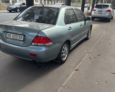 Зелений Міцубісі Lancer, об'ємом двигуна 1.6 л та пробігом 203 тис. км за 4500 $, фото 3 на Automoto.ua