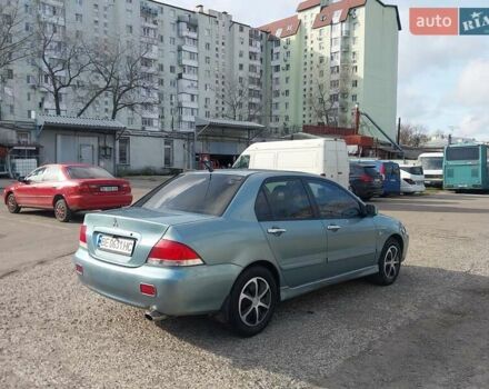Зелений Міцубісі Lancer, об'ємом двигуна 1.58 л та пробігом 272 тис. км за 3800 $, фото 10 на Automoto.ua