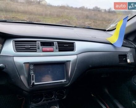 Зеленый Мицубиси Лансер, объемом двигателя 1.58 л и пробегом 224 тыс. км за 3500 $, фото 18 на Automoto.ua