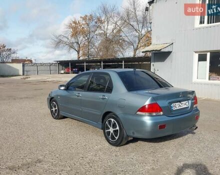 Зелений Міцубісі Lancer, об'ємом двигуна 1.58 л та пробігом 272 тис. км за 3800 $, фото 6 на Automoto.ua