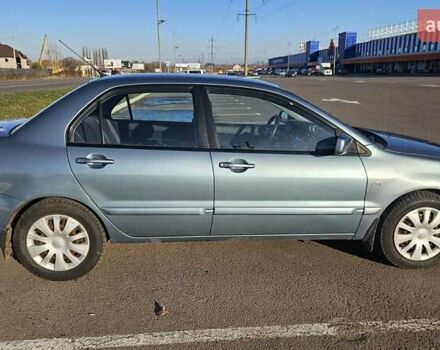 Зелений Міцубісі Lancer, об'ємом двигуна 1.58 л та пробігом 215 тис. км за 5000 $, фото 7 на Automoto.ua