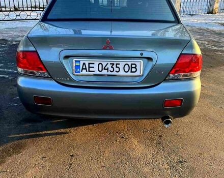 Зелений Міцубісі Lancer, об'ємом двигуна 16 л та пробігом 172 тис. км за 5900 $, фото 1 на Automoto.ua